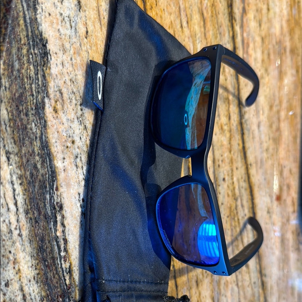 Oakley Matte Black Sunglasses with Reflective Blue Lenses